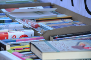 books in boxes on a table