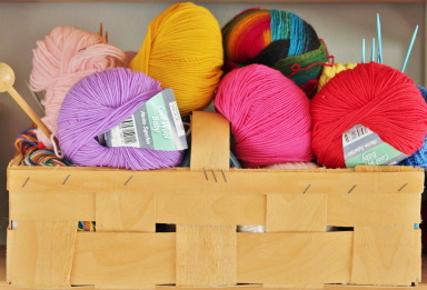 colorful yarn balls in a basket